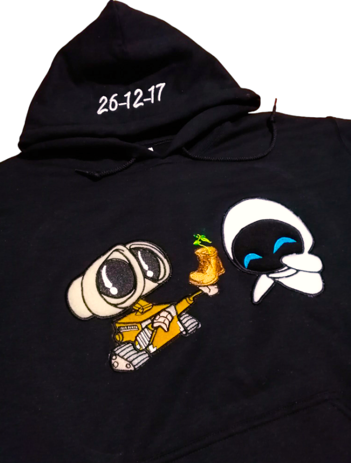 Buzo WALL-E Y EVA CON PLANTA (Fecha)