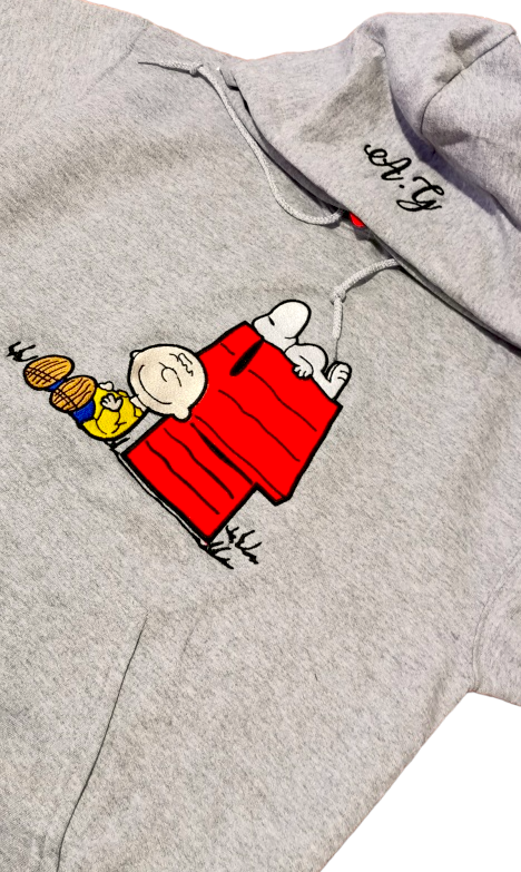 Buzo SNOOPY Y CHARLIE BROWN (Iniciales)